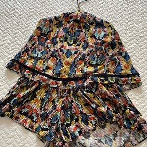 multi color romper with tie around the neck